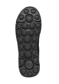 Suola di scarpa nera con un motivo di pulsanti circolari e testurizzati per la presa, realizzata in materiale gommoso, con il marchio "GEOX" ben visibile.