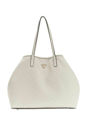 Sac tote blanc avec fines bretelles doubles, motif embossé et petit logo triangulaire doré Guess au centre devant.