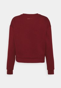 ONLY Play ONPLOUNGE LIFE NOOS - Camisola - sun dried tomato