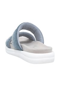Light blue sandals with two cross straps adorned with small sparkling accents. Soft gray footbed and white platform sole for comfort.