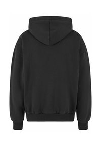 Black hoodie made of soft fabric, featuring a drawstring hood, ribbed cuffs, and waistband. Simple design without graphics or patterns.