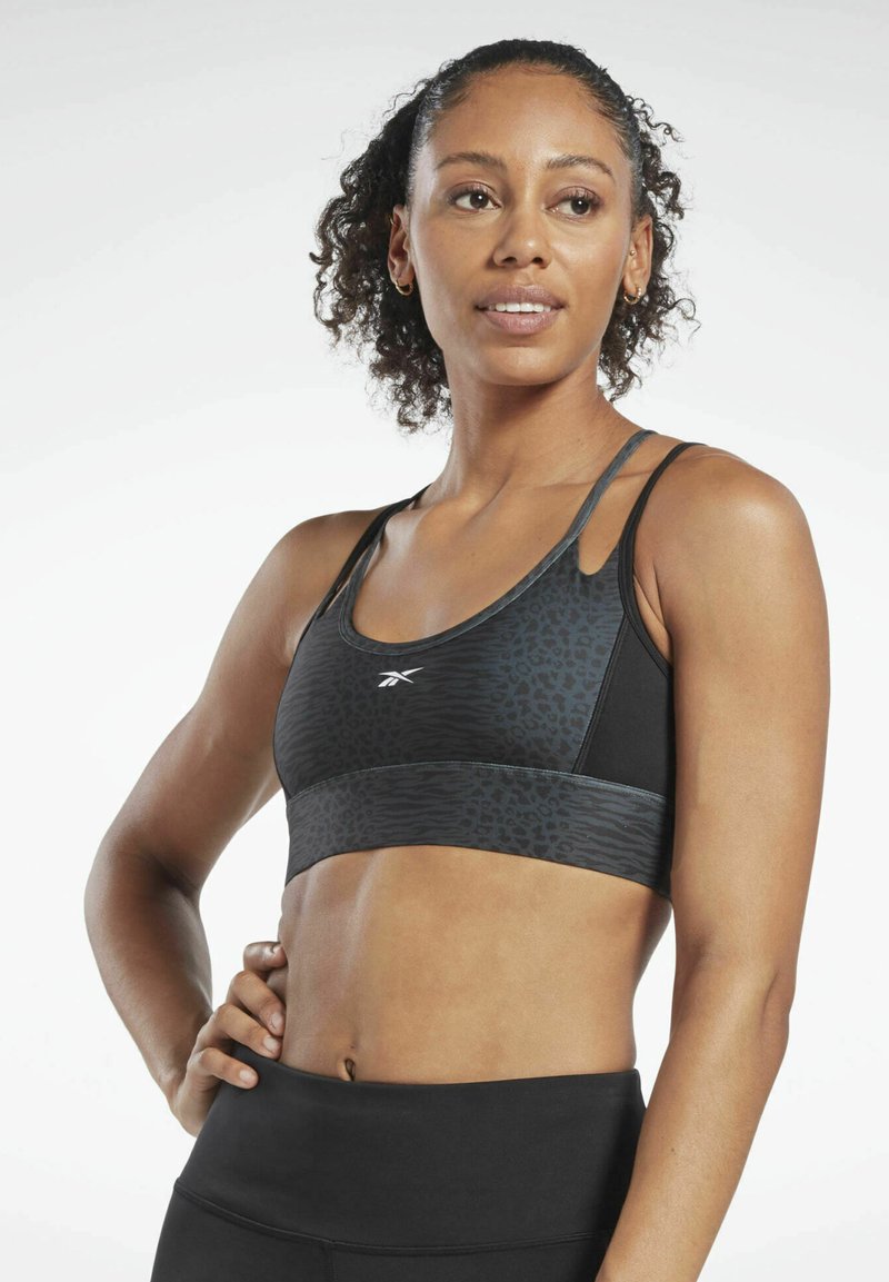 Reebok BRALETTE SportsBH'er med let støtte black/sort Zalando.dk