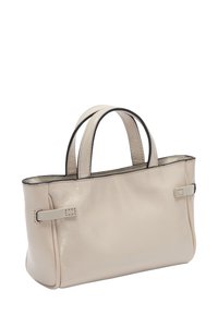 Beżowa skórzana torebka o gładkiej fakturze, prostokątnym kształcie, z dwoma krótkimi uchwytami oraz kontrastowym czarnym wykończeniem wzdłuż górnej krawędzi.