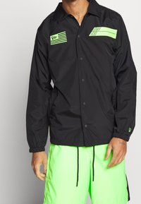 New Era Träningsjacka - black