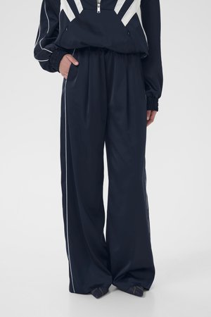 BICCA - Tracksuit bottoms - sky captain
