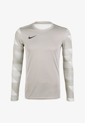 Světle šedý sportovní dres s dlouhým rukávem s vzorovanými rukávy a černým logem Nike Swoosh na horní pravé části hrudi.