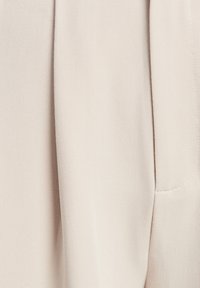 CALLI ISLA - Pantalon classique - ecru/nude - ZALANDO.FR