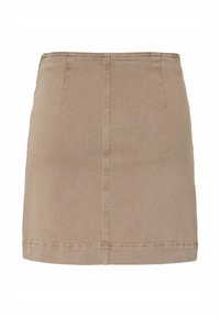 Mini-jupe beige en coton avec coutures verticales et horizontales visibles, dotée d’un ourlet droit et d’un design simple.