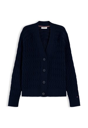 Σκούρο μπλε μεσονήσι ζακέτα πλεκτή με V-λαιμόκοψη, μακριά μανίκια, τέσσερα μπροστινά κουμπιά, ριμπ μανσέτες και στρίφωμα, τοποθετημένη επίπεδα σε λευκό φόντο.