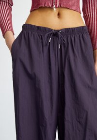 adidas Originals Träningsbyxor - dark purple