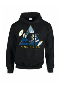 Musta huppari, jossa on värikäs printti, jossa on kolmioita, pilviä ja kelloja, ja jossa lukee "PINK FLOYD" sekä "THE DARK SIDE OF THE MOON."