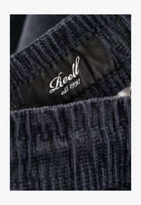 Selected, navy square cord