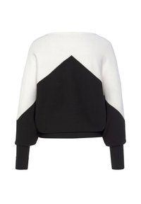 Black and white sweater featuring a textured knit design, with a wide boat neck and an angular white pattern on the back.