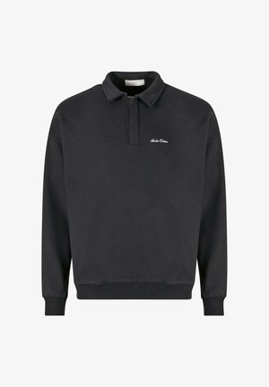 Polo sweatshirt a maniche lunghe nera in cotone, con colletto a bottoni e ricamo del logo bianco sul lato sinistro del petto. Tessuto texturizzato.