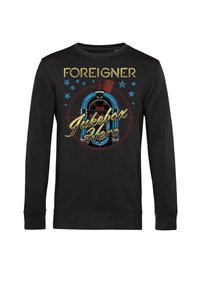 Felpa nera a maniche lunghe con una grafica di un jukebox colorato e il testo "FOREIGNER Jukebox Hero" in giallo e blu.