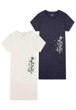 Twee jurken met korte mouwen, één witte en één marineblauwe, beide met bloemenprints aan de onderkant vlak bij de zoom.
