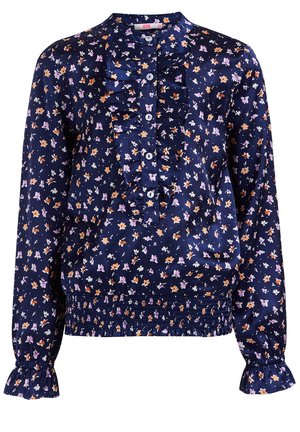 Marinebluse med små orange og lavendelfarvede blomster, flæset frontknapstolpe med hvide knapper, elastiske manchetter og linning.