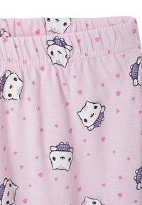 Light pink stretchy fabric with a soft texture, featuring a repeated print of cartoon cats and small pink hearts. Elastic waistband.