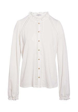 Blouse blanche à manches longues avec col et poignets à volants, devant boutonné orné de dentelle le long des boutons et des épaules.