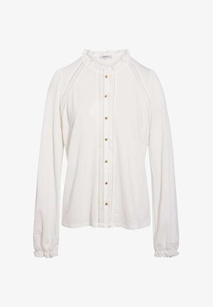 Blouse blanche à manches longues avec col et poignets à volants, devant boutonné orné de dentelle le long des boutons et des épaules.