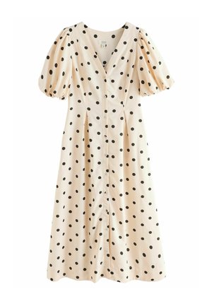 Robe beige clair à pois noirs, manches courtes bouffantes, col en V et fermeture boutonnée à l'avant s'étendant jusqu'à mi-longueur.