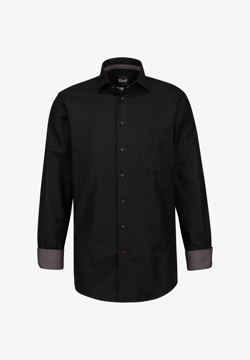 Camicia nera con bottone, maniche lunghe, caratterizzata da un motivo discreto sui polsini e una tasca sul petto. Realizzata in tessuto morbido.