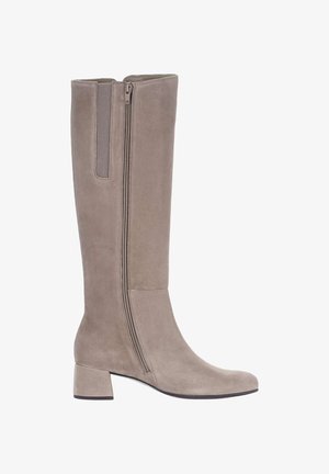 Knee-high taupe suede boot with a block heel, side zipper, smooth texture, and a rounded toe design. Accented with a contrasting panel.