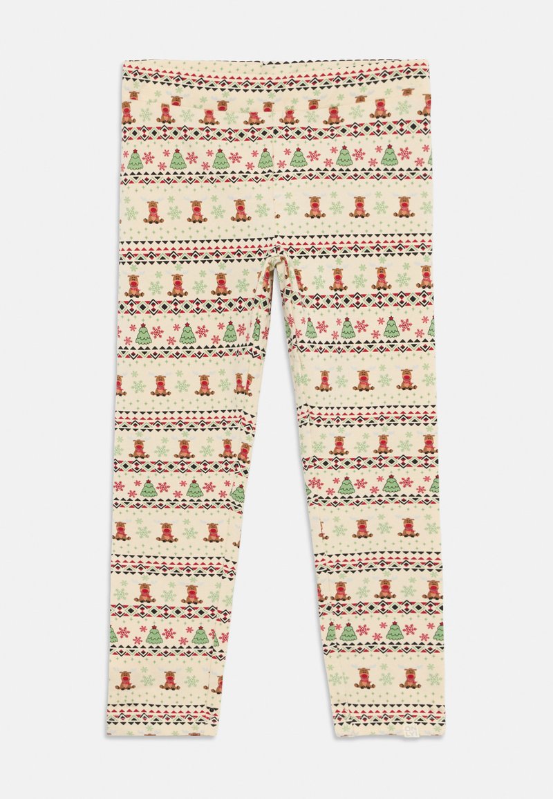 Otroške kremne legice z rdečonoravnimi jeleni, zelenimi božičnimi drevesi, rdečimi snežinkami in črnimi geometrijskimi črtami.