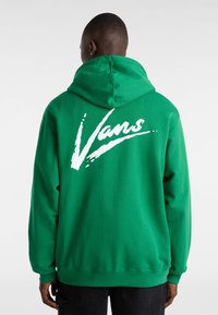 Felpa verde con una grande grafica bianca "Vans" sulla schiena. Il materiale è morbido, con cappuccio regolabile e polsini e orlo a coste.
