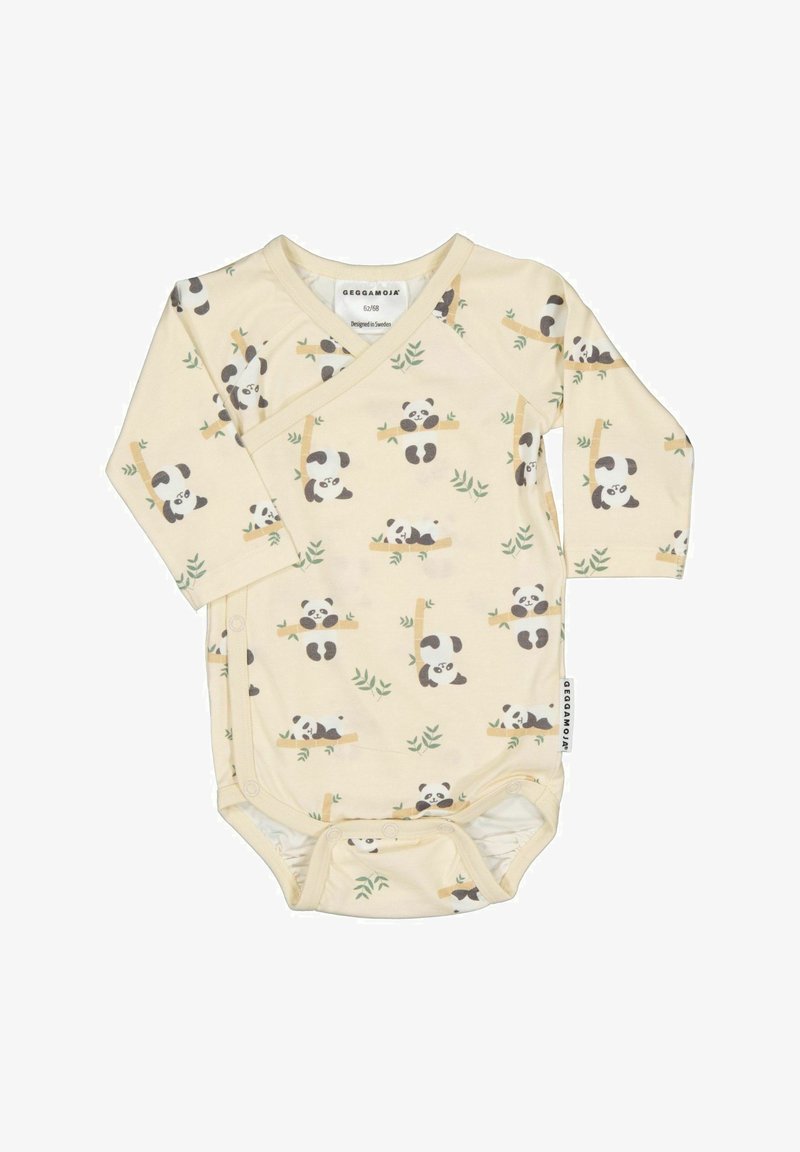 Kermanvärinen vauvan body, jossa on pitkät hihat, napit ja leikkisiä pandakuvioita bambuhaarojen kanssa vihreiden lehtien taustalla.