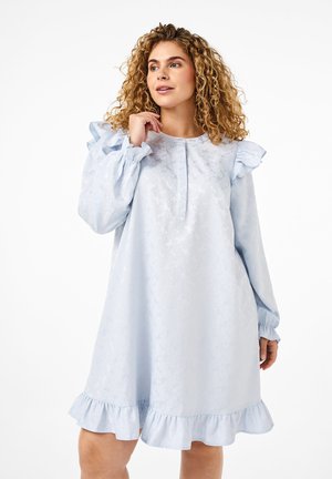 Light blue dress with floral texture, ruffled sleeves, and a gathered hem. Features a round neckline with a simple button closure.