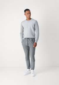 BOSS Tracksuit bottoms - dark beige