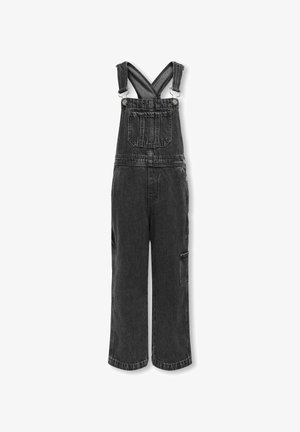 Pettorina in denim nero con spalline regolabili, tasca frontale, tasca laterale cargo e gambe ampie; tessuto testurizzato con una finitura sbiadita.