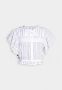 Blusa bianca corta con scollatura e maniche volant, caratterizzata da righe verticali e dettagli in pizzo, chiusura a bottoni e orlo arricciato.