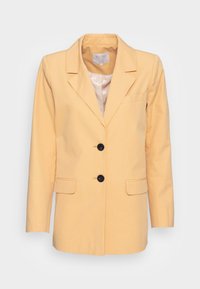 Blazer giallo con chiusura a un bottone, rever a scollo a V, due tasche frontali e fodera liscia. Realizzato in un tessuto leggero.