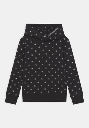 Sudadera negra con capucha que presenta un diseño estampado de pequeños logotipos "CK" en blanco, y puños y dobladillo acanalados.