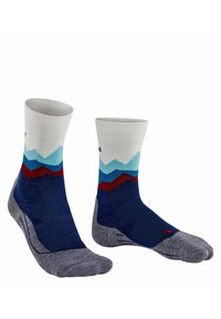 Calze alte fino al ginocchio con un design a gradiente di montagne in blu, rosso e bianco. Realizzate in tessuto testurizzato con aree rinforzate di colore grigio per il tallone e le punte.