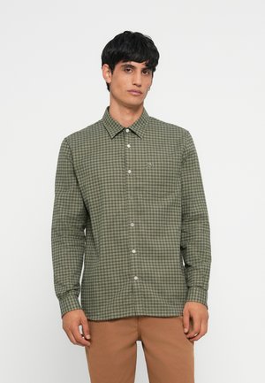Green checkered shirt made of lightweight fabric with a button-down collar and long sleeves, featuring a small logo on the chest.