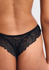 Erlich Textil FLUID BRAZIL - String - schwarz