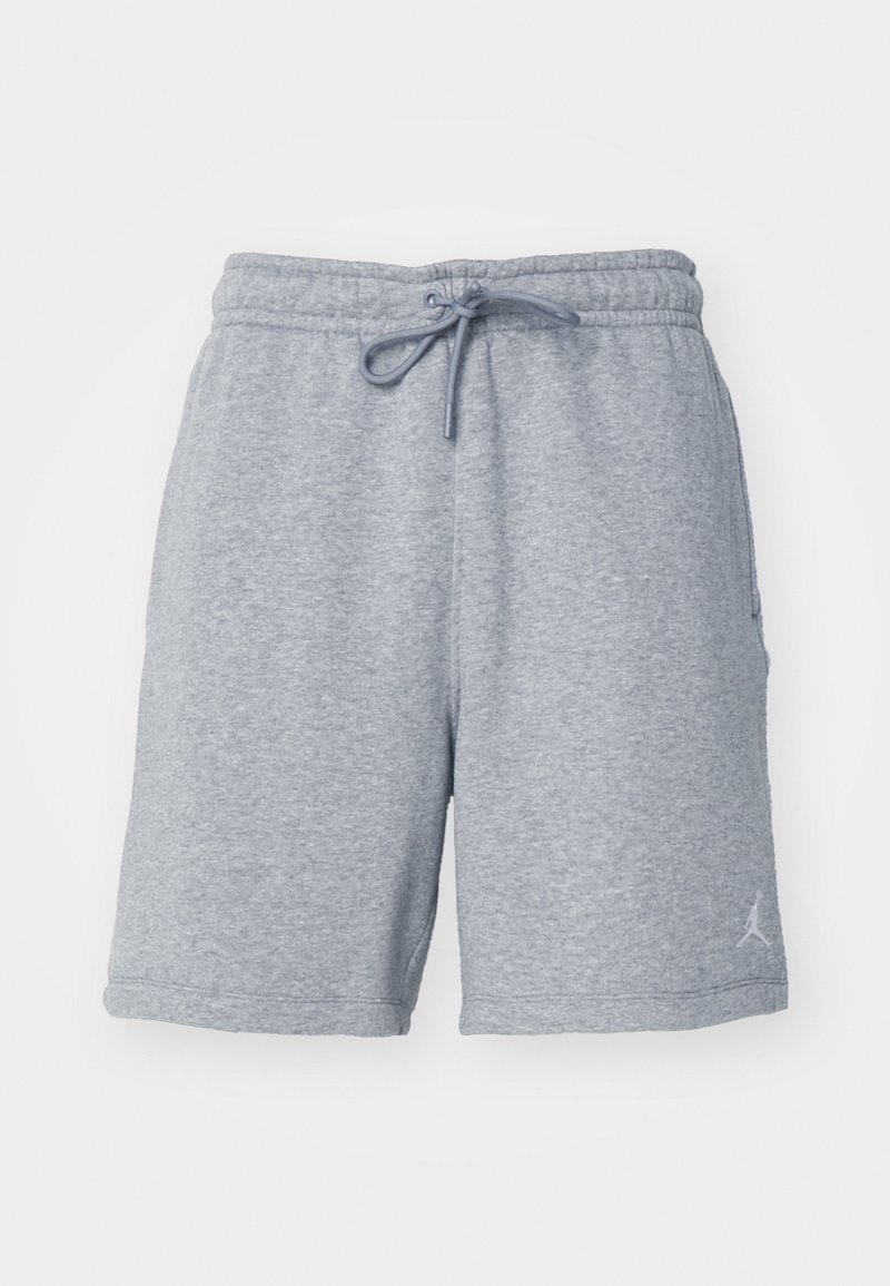 Pantalones cortos de sudadera grises, hechos de una tela suave, con una cinturilla elástica que incluye un cordón y un logotipo sutil en la parte inferior de la pierna izquierda.