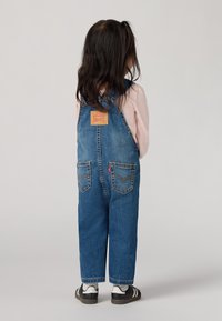 Levi's® SHORTALL - Traksipüksid - blue denim
