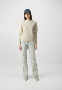 Calvin Klein HERO LOGO - Sudadera - wood ash