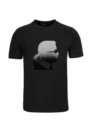 Camiseta negra de algodón con un estampado gráfico de un perfil estilizado con gafas de sol, que va de gris claro a gris oscuro.