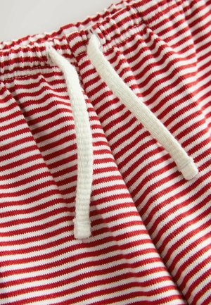 Rot-weiße gestreifte Shorts mit weicher Textur, ausgestattet mit einem weißen Kordelzug und elastischem Bund.