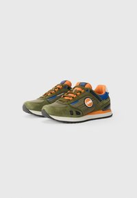 Green suede and fabric sneakers with orange and blue accents, featuring a white logo, black outsole, and perforated side panels.