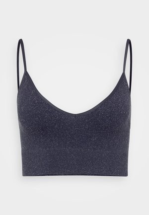 Jūras zila bralette, kas izgatavota no teksturēta auduma ar smalku spīdumu, ar tām plānām regulējamām siksnām un V-veida izgriezumu. Elastīga un bezšuvju.