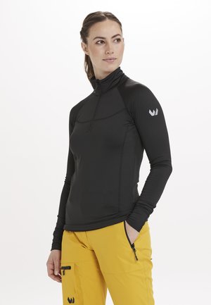 Schwarzes Langarm-Zip-Up-Top mit hohem Kragen, nahtlosem Design und reflektierendem Logo auf der linken Schulter.
