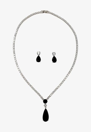 Silberne metallische Halskette mit klaren Strasssteinen und einem zentralen schwarzen Steinanhänger. Passende Ohrringe mit einem ähnlichen Design.