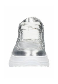 Silver athletic shoe with a shiny metallic finish, white laces, and a cushioned white sole. Features stitched detailing around the upper.