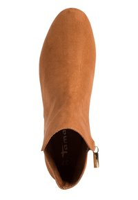 Bota de tobillo de ante marrón con punta redondeada, cremallera lateral con tirador metálico y marcado de tamaño 37 en el interior.